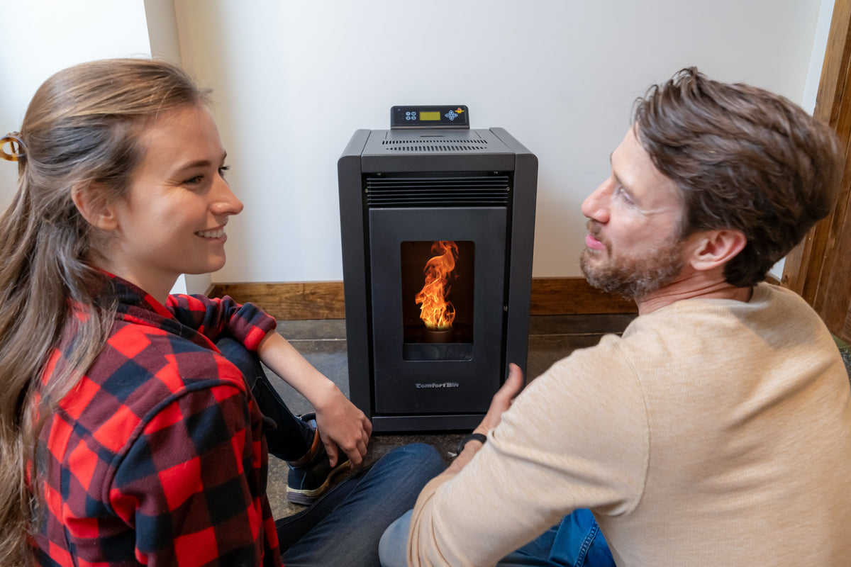 ComfortBilt Alpine HP40 pellet stove – Black, couple relaxing beside the stove