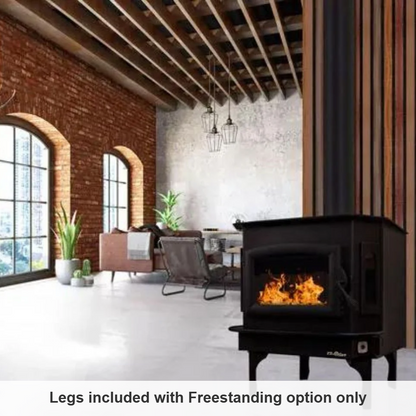 Carolina Model 81 freestanding wood stove in a loft with brick walls and large windows